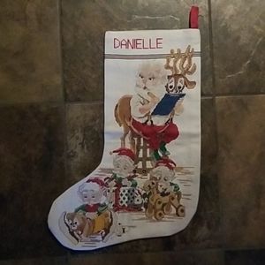 Handmade counted cross stitch with name "Danielle"